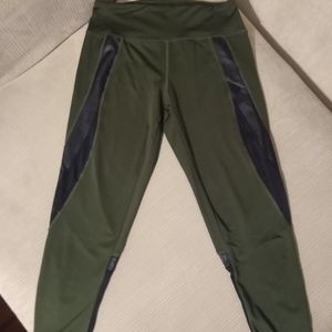 Green leggings with mesh detail